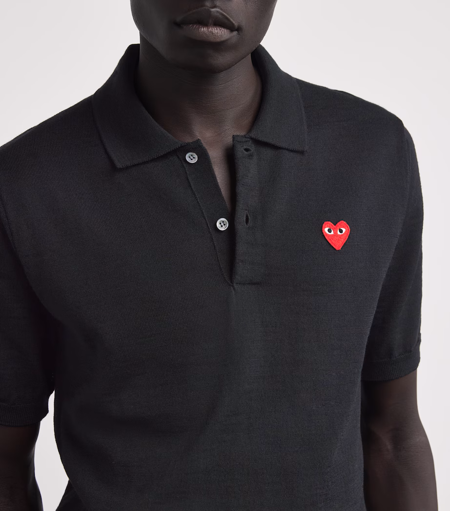 CDG Model Wearing Black Polo